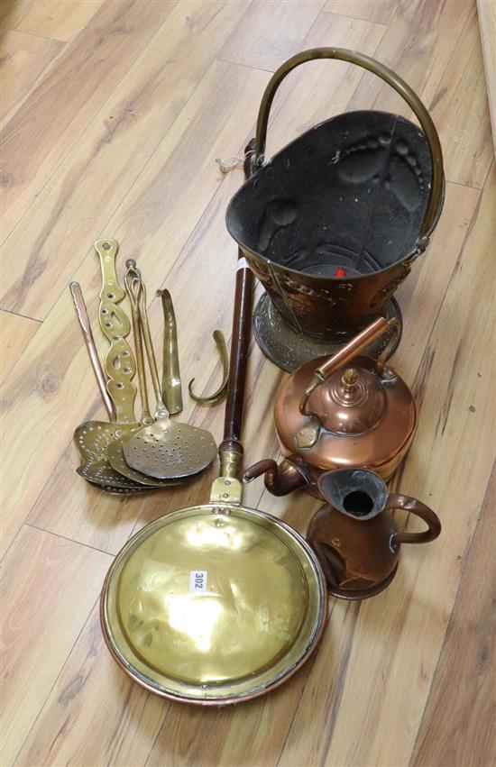 A 19th century brass warming pan, a Victorian trivet and sundry metalware